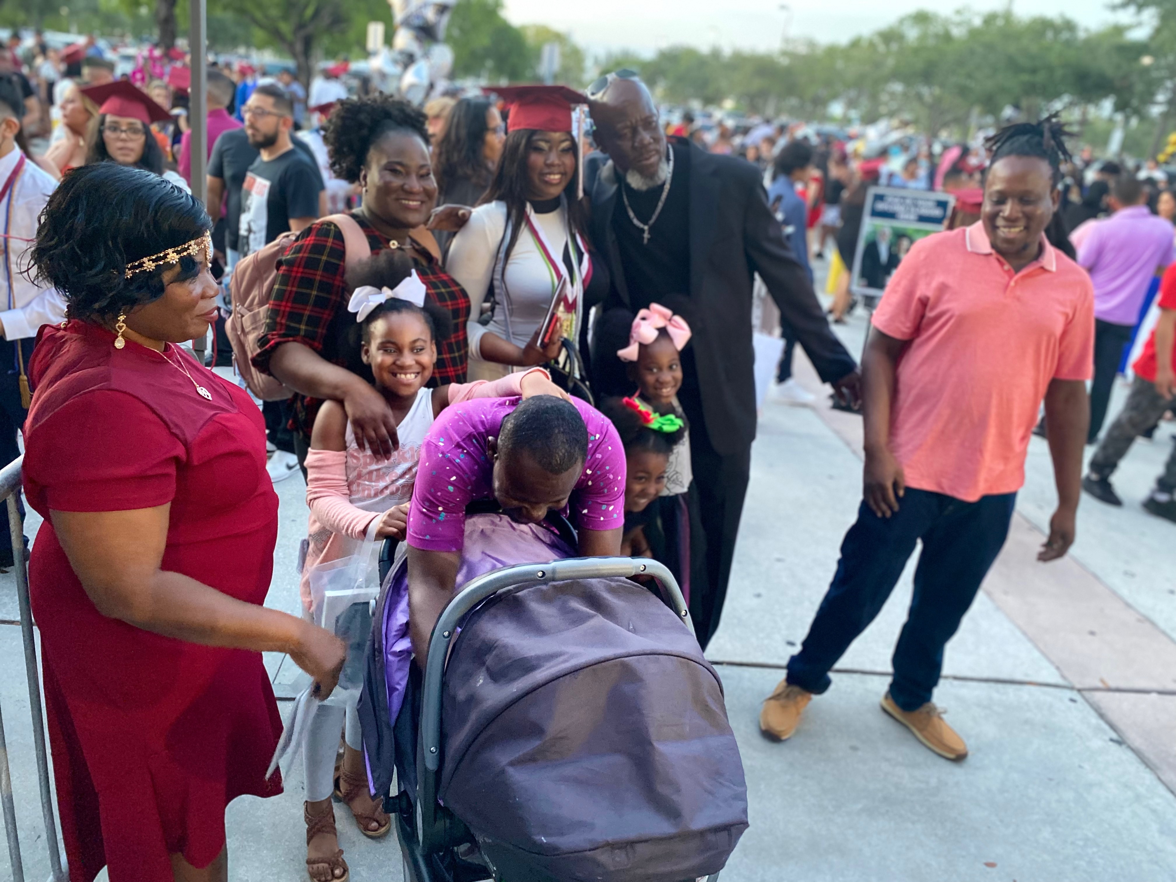 Duffy celebrating with family at a graduation