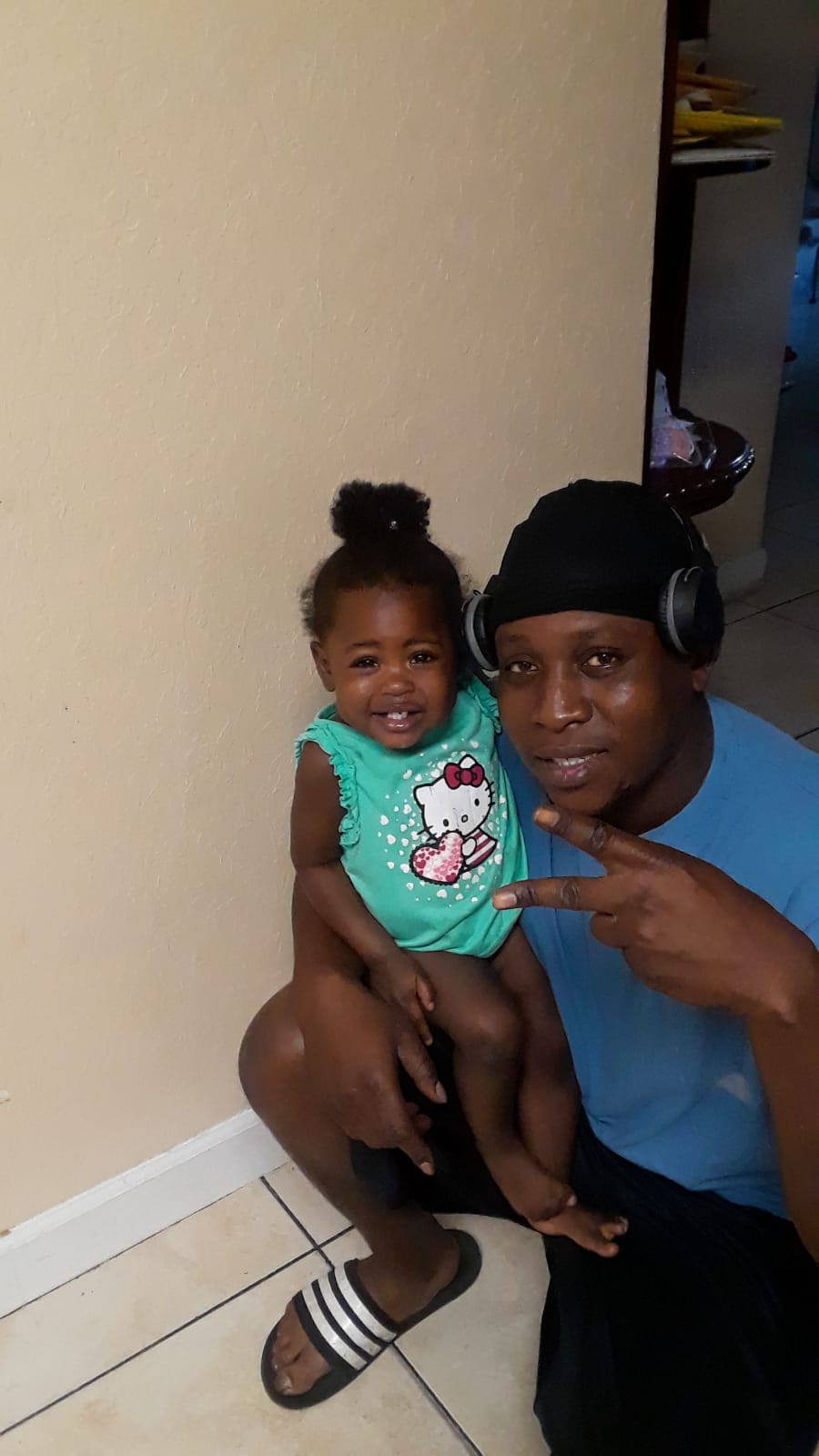 Duffy holding a young child